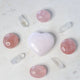 Rose Quartz Palm Stones in Grid with Pink Calcite Heart and Clear Quartz Points